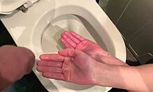 A European female and male duo, burn out and filthy, delight themselves in their fetishes, foreskin and hands in a pissing scene